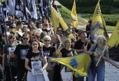 Ukrainians take part in procession for the 'Day of Defenders of Ukraine' in Kyiv