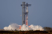 SpaceX's next-generation Starship spacecraft atop its Super Heavy booster is launched on its eighth test at the company's Boca Chica launch pad in Brownsville