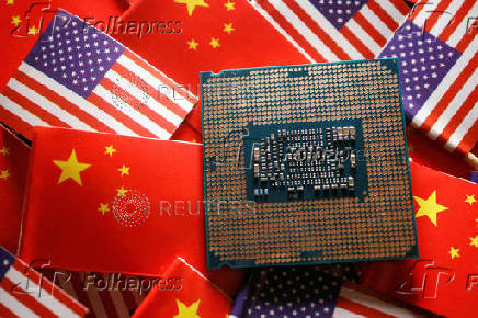 FILE PHOTO: Illustration picture of Chinese and U.S. flags with semiconductor chip