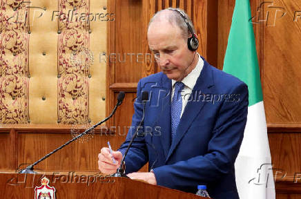 Ireland's Foreign Minister Micheal Martin attends a joint press conference with Jordan's Foreign Minister Ayman Safadi in Amman