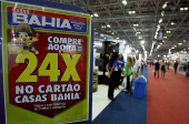 FILE PHOTO: Consumers visit the Casas Bahia mega store during opening day in Rio de Janeiro
