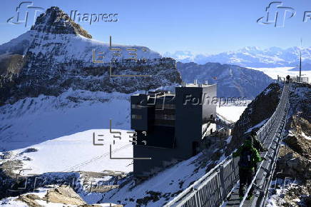 Swiss Alps restaurant reopens after fire