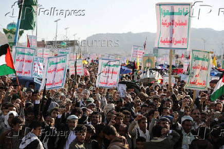 Protesters show support to Lebanon?s Hezbollah and Palestinians in the Gaza Strip, in Sanaa