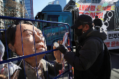 Protesters take part in a rally calling for the impeachment of South Korean President Yeol, in Seoul