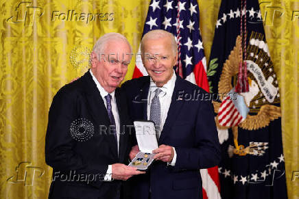 U.S President Biden gives the Presidential Citizens Medal, one of the country's highest civilian honors, during a ceremony at the White House in Washington