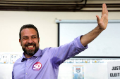 Sao Paulo mayor candidate leftist Guilherme Boulos gestures after voting at a polling station during the municipal elections in Sao Paulo