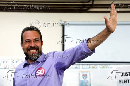 Sao Paulo mayor candidate leftist Guilherme Boulos gestures after voting at a polling station during the municipal elections in Sao Paulo