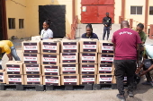 Boxes of supplies are distributed to the poor in Lagos