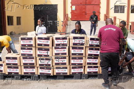 Boxes of supplies are distributed to the poor in Lagos