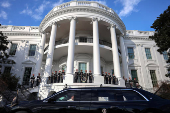 U.S. President Joe Biden's motorcade waits outside the White House in Washington