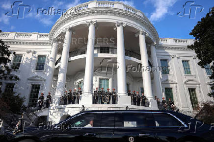 U.S. President Joe Biden's motorcade waits outside the White House in Washington