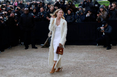 Guests arrive at Schiaparelli Haute Couture Spring/Summer 2025 show in Paris