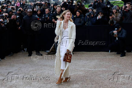 Guests arrive at Schiaparelli Haute Couture Spring/Summer 2025 show in Paris