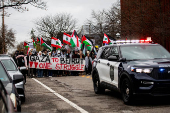 Protest in front of the residence of the University of Michigan's president, in Ann Arbor