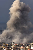 Smoke billows over Beirut's southern suburbs after Israeli strike, as seen from Baabda