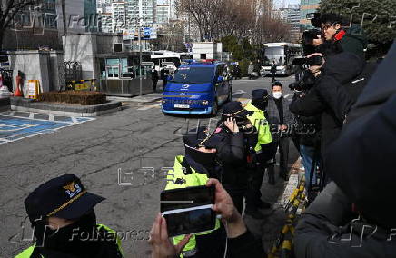 South Korea's impeached President Yoon Suk Yeol arrives for court