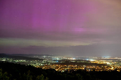 An aurora borealis is seen from Harmashatar Hill in Budapest