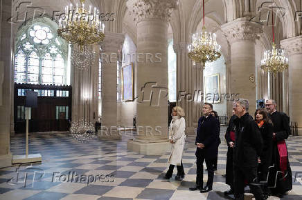 French President Macron visits the Notre-Dame Cathedral, in Paris