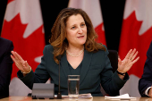 FILE PHOTO: Canada's Deputy Prime Minister and Minister of Finance Chrystia Freeland takes part in a press conference in Ottawa
