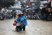 Red River overflows causing severe flooding in Hanoi following Typhoon Yagi