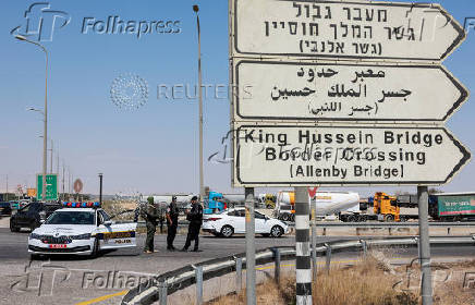 Israeli police patrol the area near Allenby Bridge Crossing between the West Bank and Jordan following a shooting incident at the crossing in the Israeli-occupied West Bank