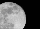 The full moon, known as the Hunter's moon, rises over Mexico City