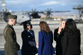 U.S. Vice President and Democratic presidential candidate Kamala Harris greets Colonel Catherine M. Grush upon arrival at Reno-Tahoe International Airport in Reno