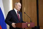 Russian President Putin attends a press conference in Astana