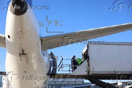 Damascus and Aleppo airports reopen after the ouster of al-Assad