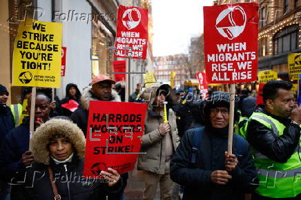 Harrods staff strike for Christmas bonus and better conditions.