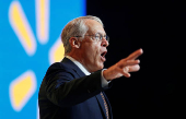 FILE PHOTO: Walton, Walmart chairman of the Board of Directors, speaks at the company's annual shareholders meeting in Fayetteville