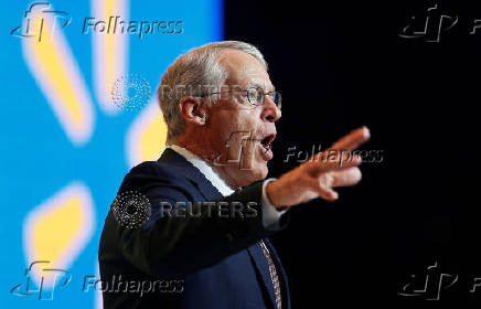 FILE PHOTO: Walton, Walmart chairman of the Board of Directors, speaks at the company's annual shareholders meeting in Fayetteville