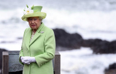 FILE PHOTO: Britain's Queen Elizabeth arrives for a visit to the Giant's Causeway in Northern Ireland