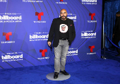 El negro y los diseos clsicos intervenidos dominaron la alfombra de los Latin Billboards