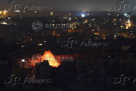 Smoke billows over Beirut's southern suburbs, after an Israeli strike