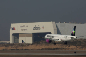 A plane of the Mexican low-cost airline Volaris prepares for landing at the General Abelardo L. Rodriguez International Airport, in Tijuana