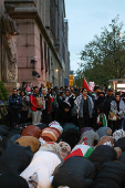 Demonstrators protest in solidarity with Pro-Palestinian organizers on the Columbia University campus, in New York City