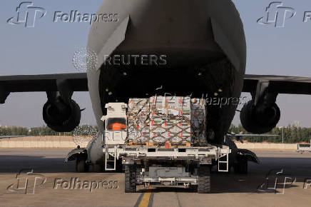 Aid for Lebanon is being loaded onto a cargo aircraft at the al-Reef Military Airport, in Abu Dhabi