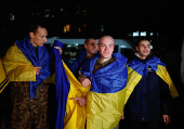 Ukrainian prisoners of war (POWs) return after a swap, in an undisclosed location