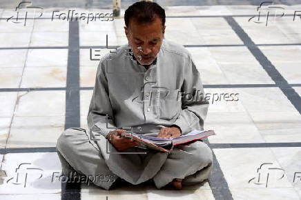 Muslims read from the Quran during Ramadan in Pakistan