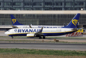 Two Boeing 737-8AS passenger aircrafts of Ryanair airline, taxi on a runway at Malaga-Costa del Sol airport, in Malaga