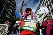 People demonstrate in support of Palestinians in Gaza, in London