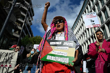 People demonstrate in support of Palestinians in Gaza, in London