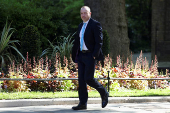 FILE PHOTO: Britian's Northern Ireland minister Chris Heaton-Harris at Downing Street in London