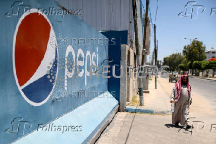 FILE PHOTO: In West Bank, Pepsi and Coke bottlers face can and sugar shortage