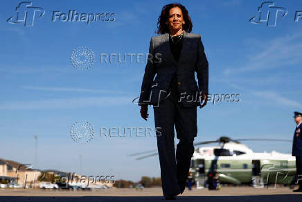 Democratic presidential nominee U.S. Vice President Kamala Harris boards Air Force Two to depart for Michigan