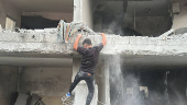 Aftermath of Israeli strike on a house in Gaza's Jabalia