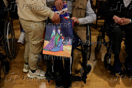 The Three Wise Men visit children and elderly people, ahead of the Epiphany parade, in Ronda