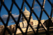 Security fencing encircles the U.S. Capitol building in Washington