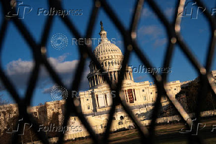 Security fencing encircles the U.S. Capitol building in Washington